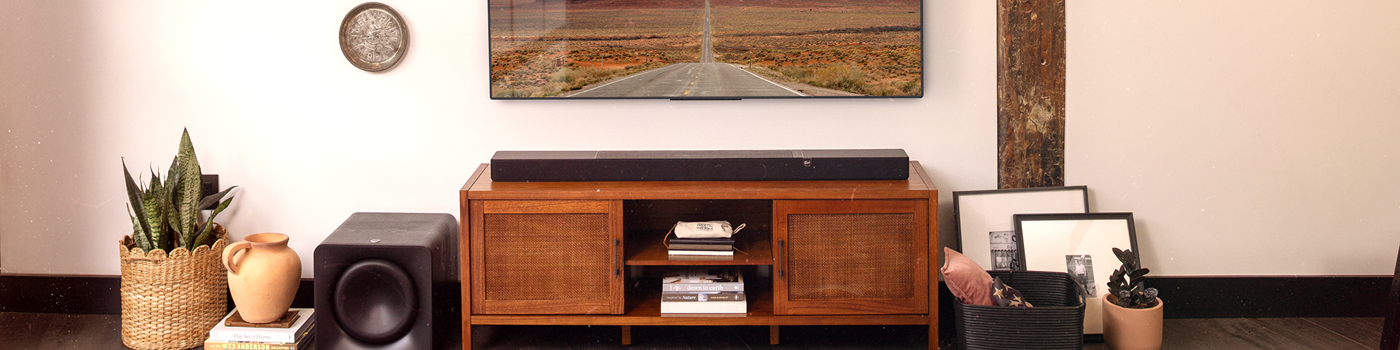 Klipsch Flexus Core 300 Powered by Onkyo below tv in large bright living area 2000x500