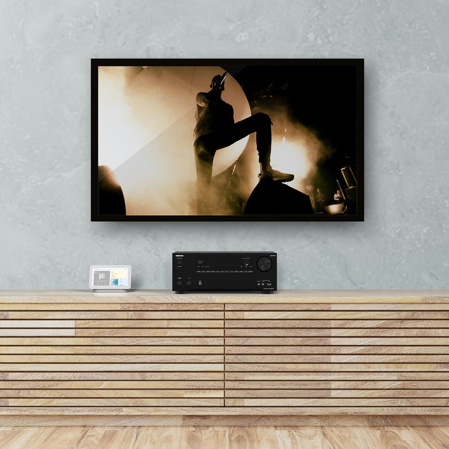 Onkyo 7100 RP8060 FA Beside TV Showing Concert MOBILE