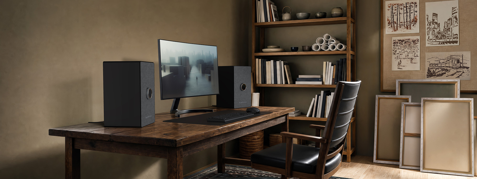 Onkyo GX Ai O flanking a computer on desk 2000x750