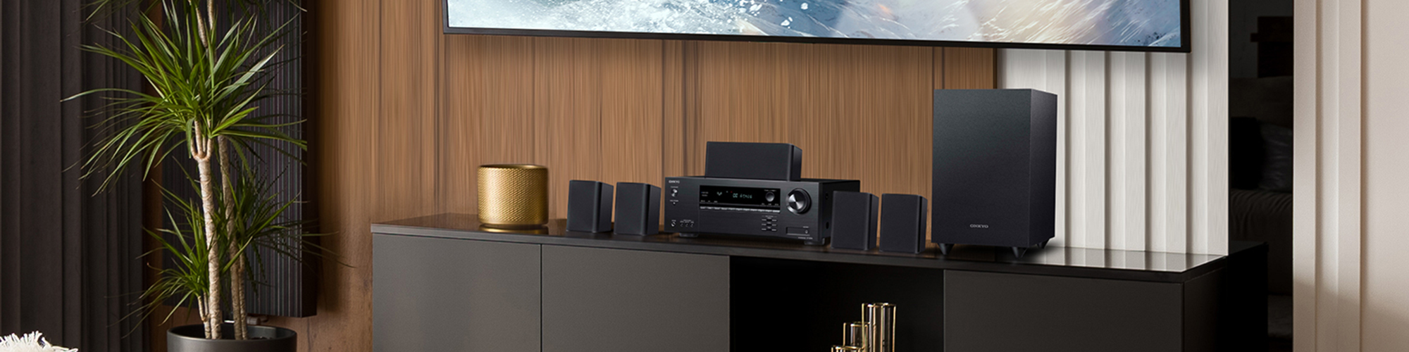 Onkyo HT S3910 in high end living room with snow boarder on tv above 2000x500