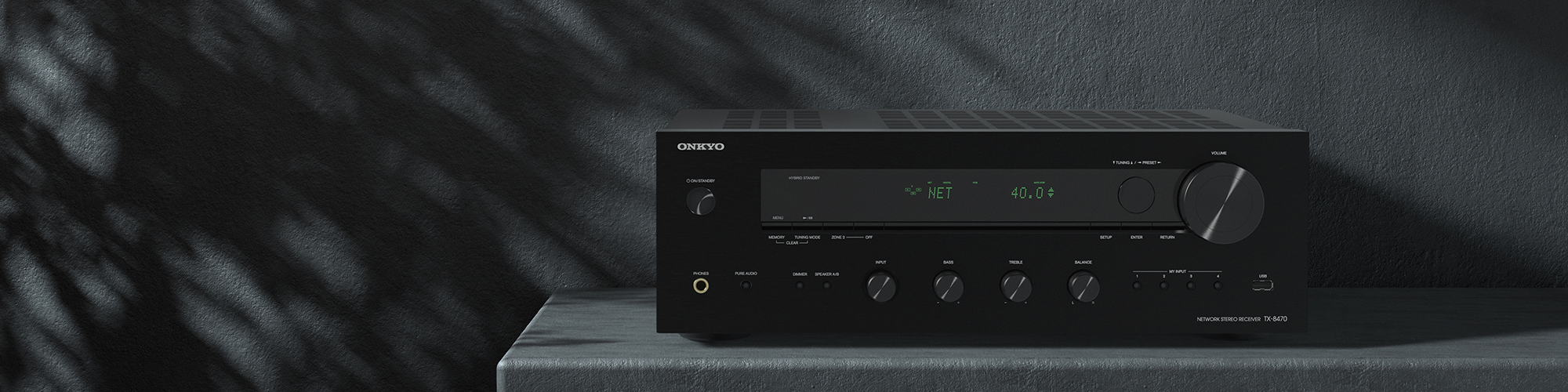 Onkyo TX 8470 MDC in beautiful dark setting with shadows on wall behind 2000x500