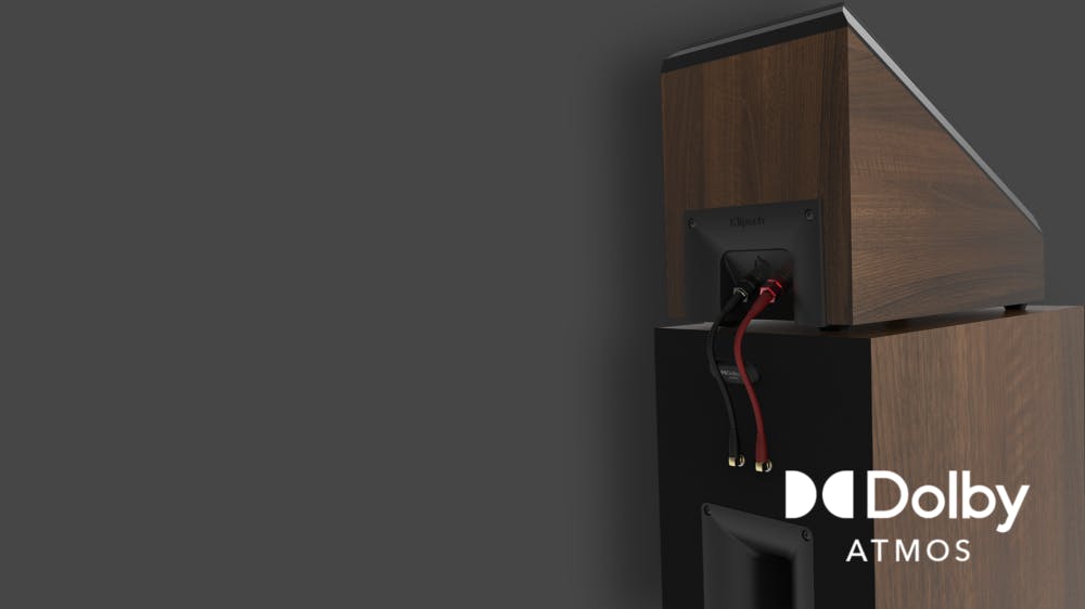 RP 5000 F II rear view displaying connections to an RP 500 SA Dolby Atmos elevation speaker with Dolby Atmos logo