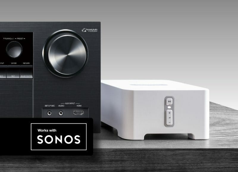 cut off image of av receiver with works with sonos logo