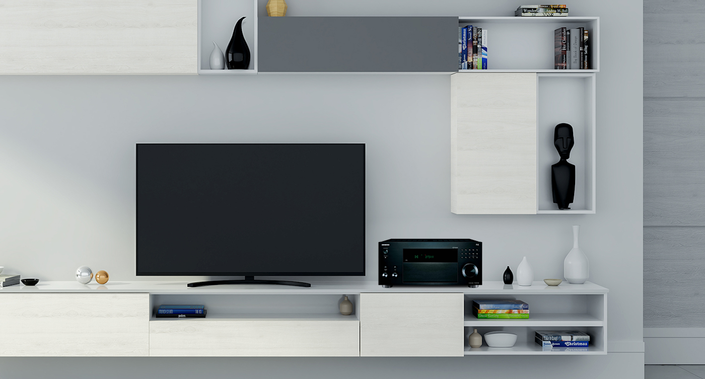 AV Receiver next to TV in modern living room in a monochromatic palette